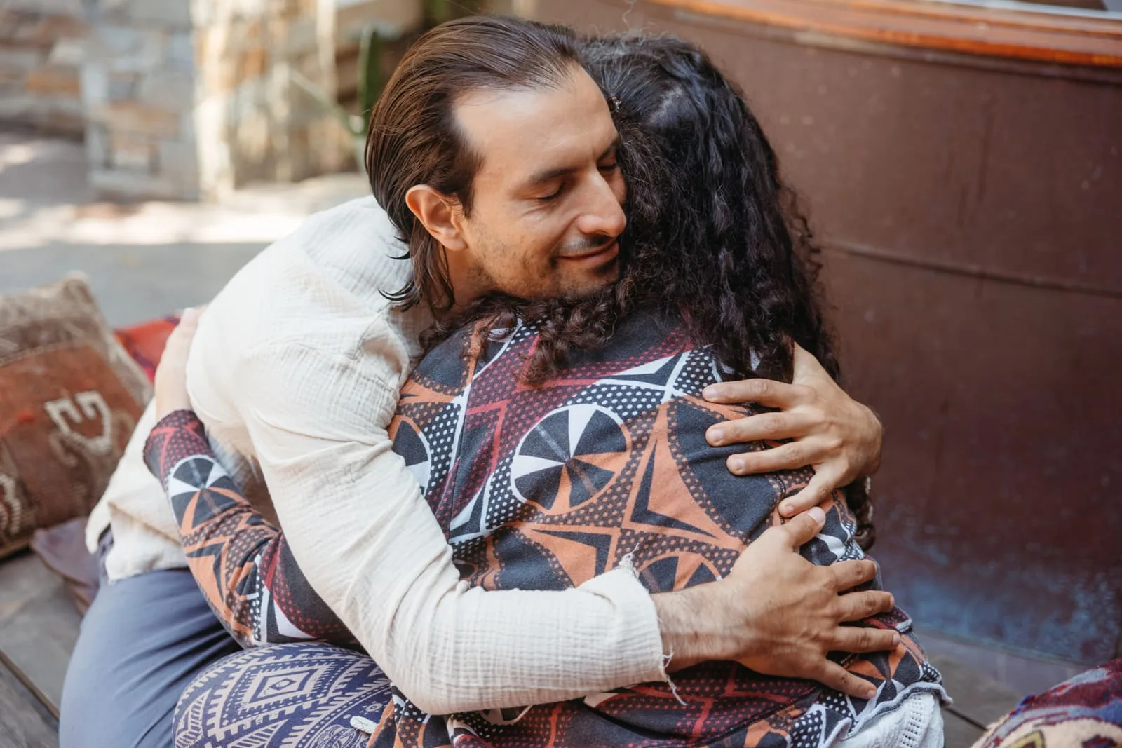 Iván Chocrón holding a participant in a moment of compassionate presence